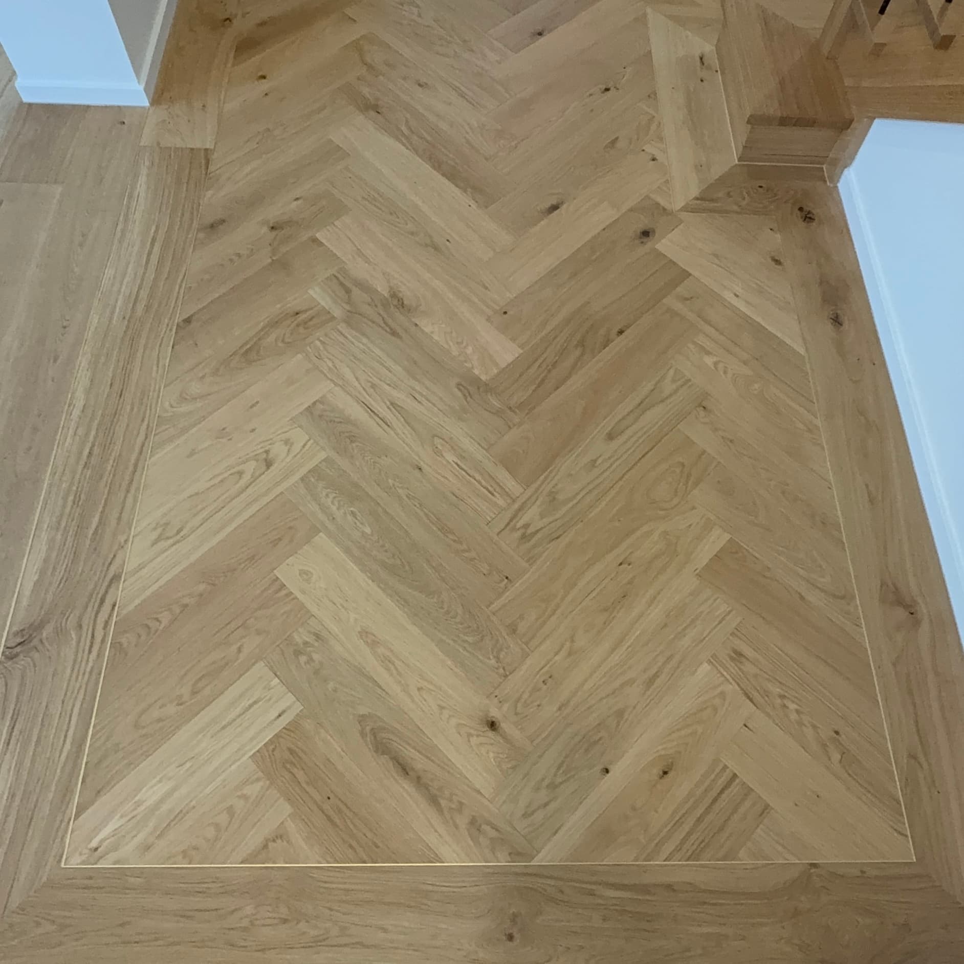 Herringbone Engineered With Border and Trim insertred